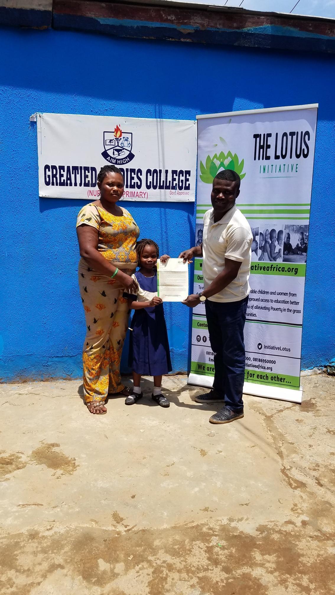 Mrs. Popoola with Scholar Kolapo Popoola and Lotus Initiative Program Manager.