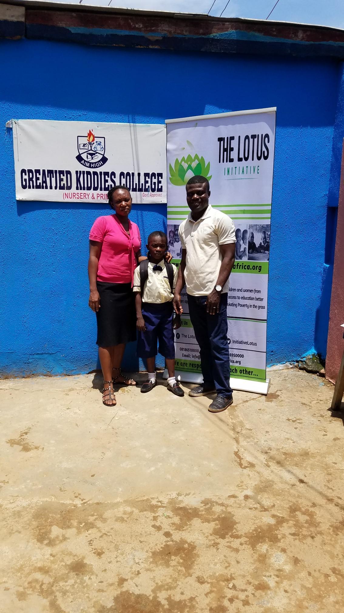 Lotus Program Manager, Lotus Scholar David Oyegoke with staff of Greatied Comprehensive School.