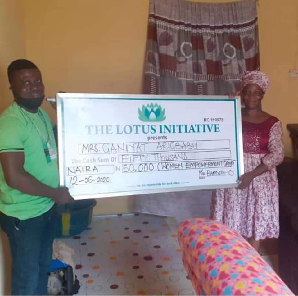 Presentation of 50k grant to Mrs. Ganiyat Arigbabuwo under Women Empowerment Grant of Lotus Initiative.