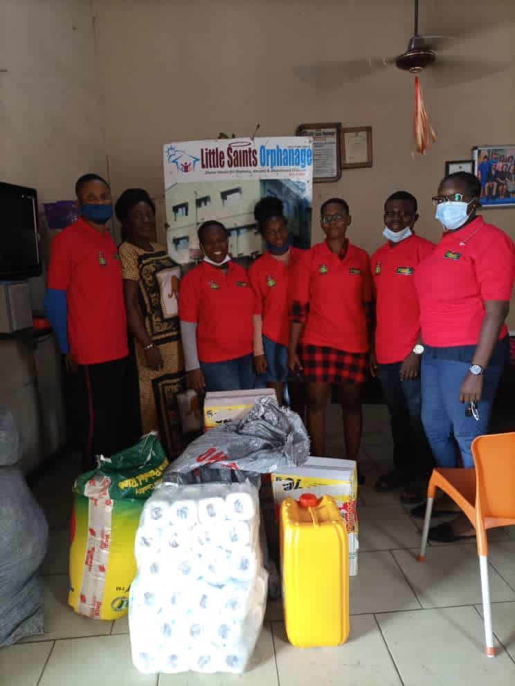 Lotus Initiative Team with REEL Foundation Staff at Little Saint Orphanage, Abule Egba to Present Gift Items.